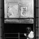 Woman in Window (Vertical)